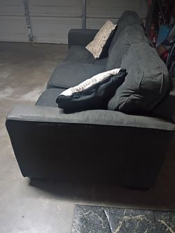 Blue long couch, comfy, 75 inches long.
