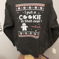 XL Christmas themed black sweatshirt "I put a cookie in that oven" 
