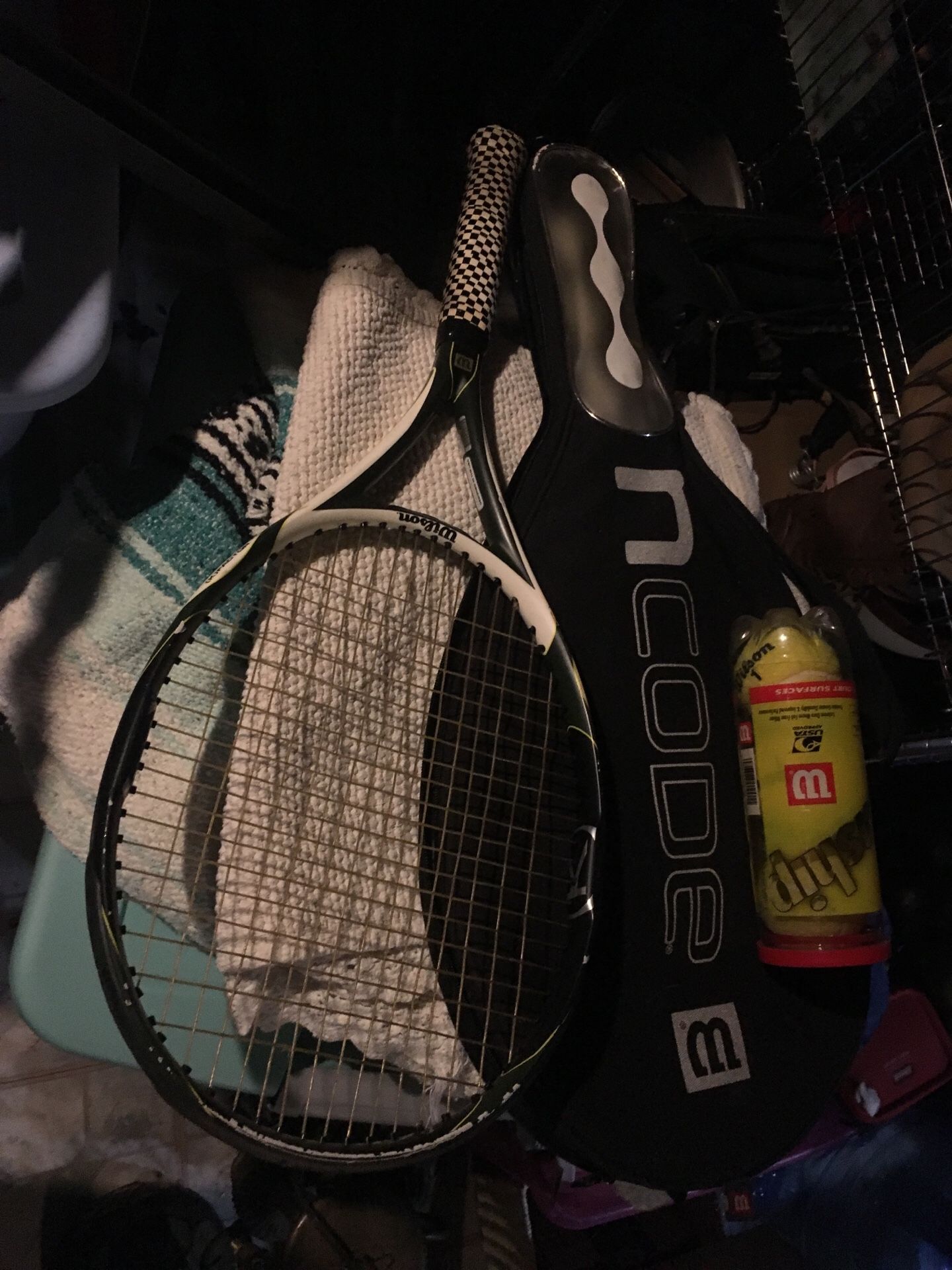 Titanium racket with tennis balls