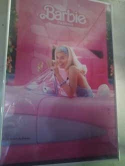 Barbie poster in poster frame $15 obo?