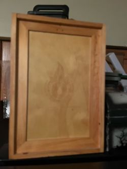 Wooden apothecary cabinet with oils