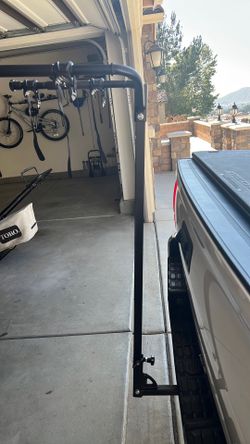 Two bike carrier, with extended neck, couples to a two inch by two inch hitch