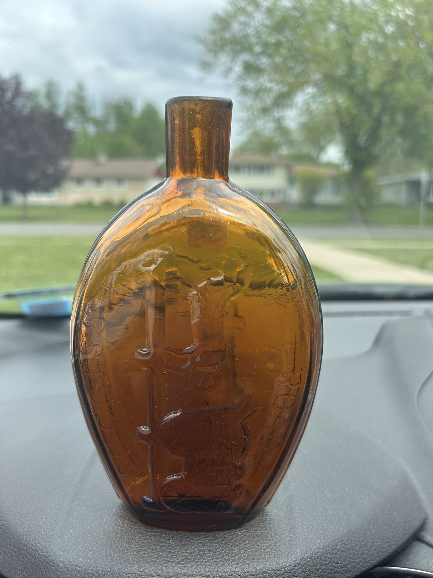 Clevenger Bros. Glass Works Clayton NJ Amber Glass Bottle with an Eagle & Grapes