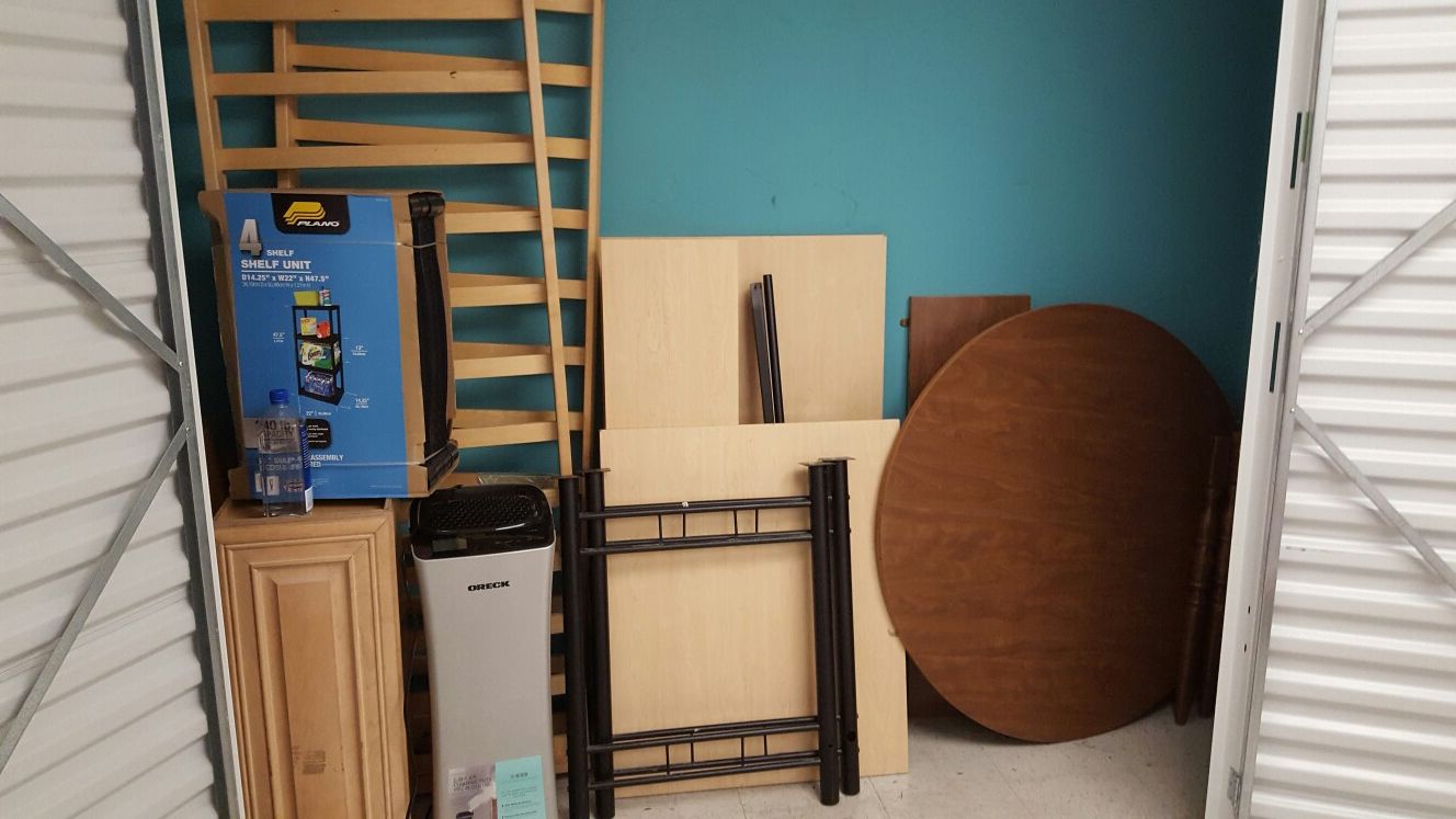 Solid oak full size futon bed frame, solid oak wall cabinet, 'L' shaped desk, kitchen table w/ leaf, air purifier & shelf unit. All for $150 OBO
