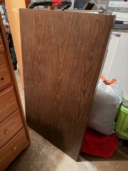 FOLDING TABLE  45 1/2"w x 27"deep; heavy's; 2 cushions on the feet need to be replaced; cross  streets are Arapaho & Waterview