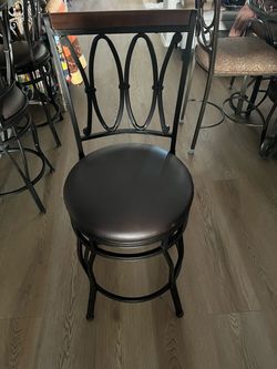 Black Metal Bar Stool with Cushioned Seat