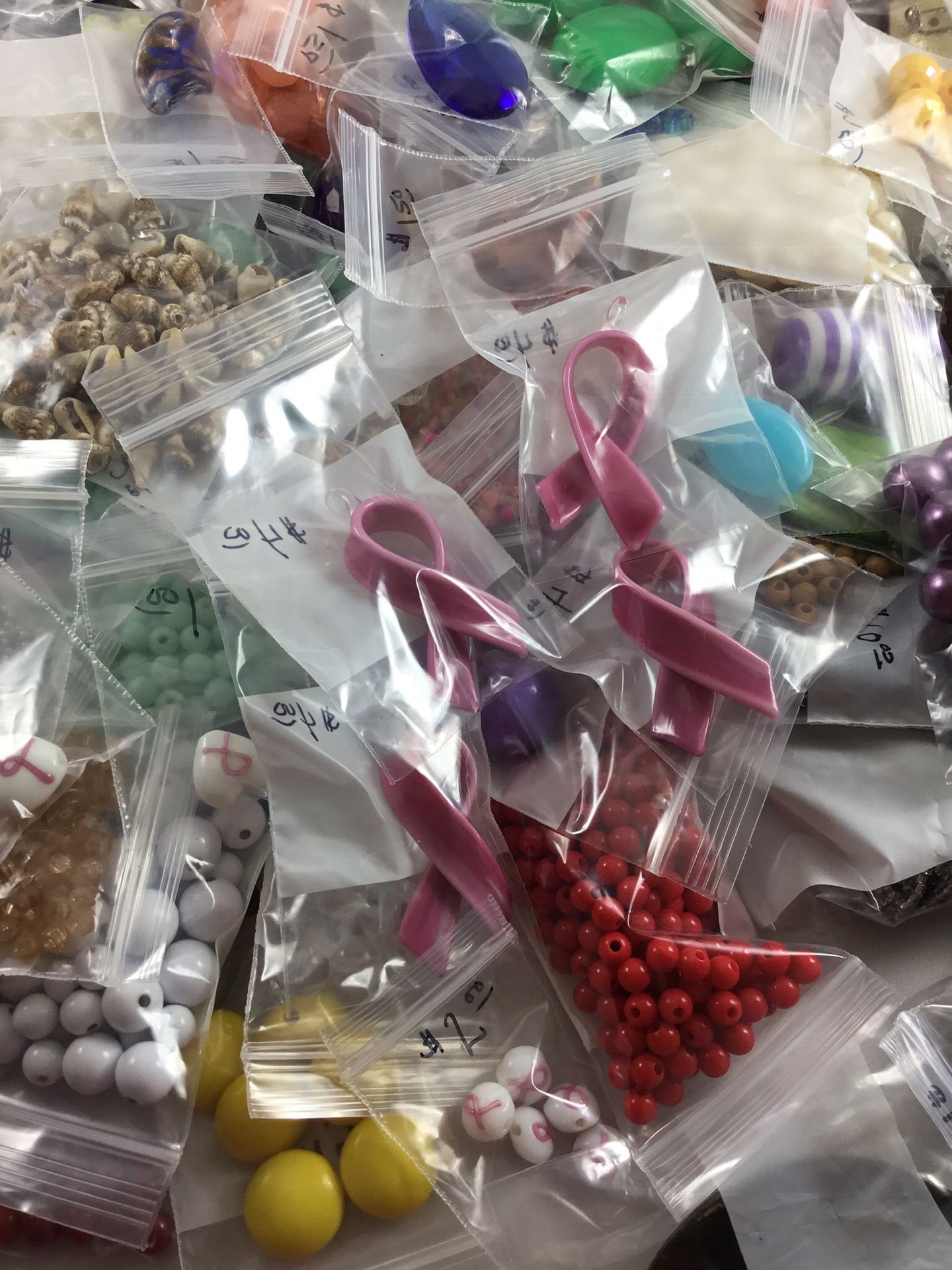 Lots of reclaimed beads from jewelry, cleaned, make your creations unique, prices vary per bag, the more you buy the better the price