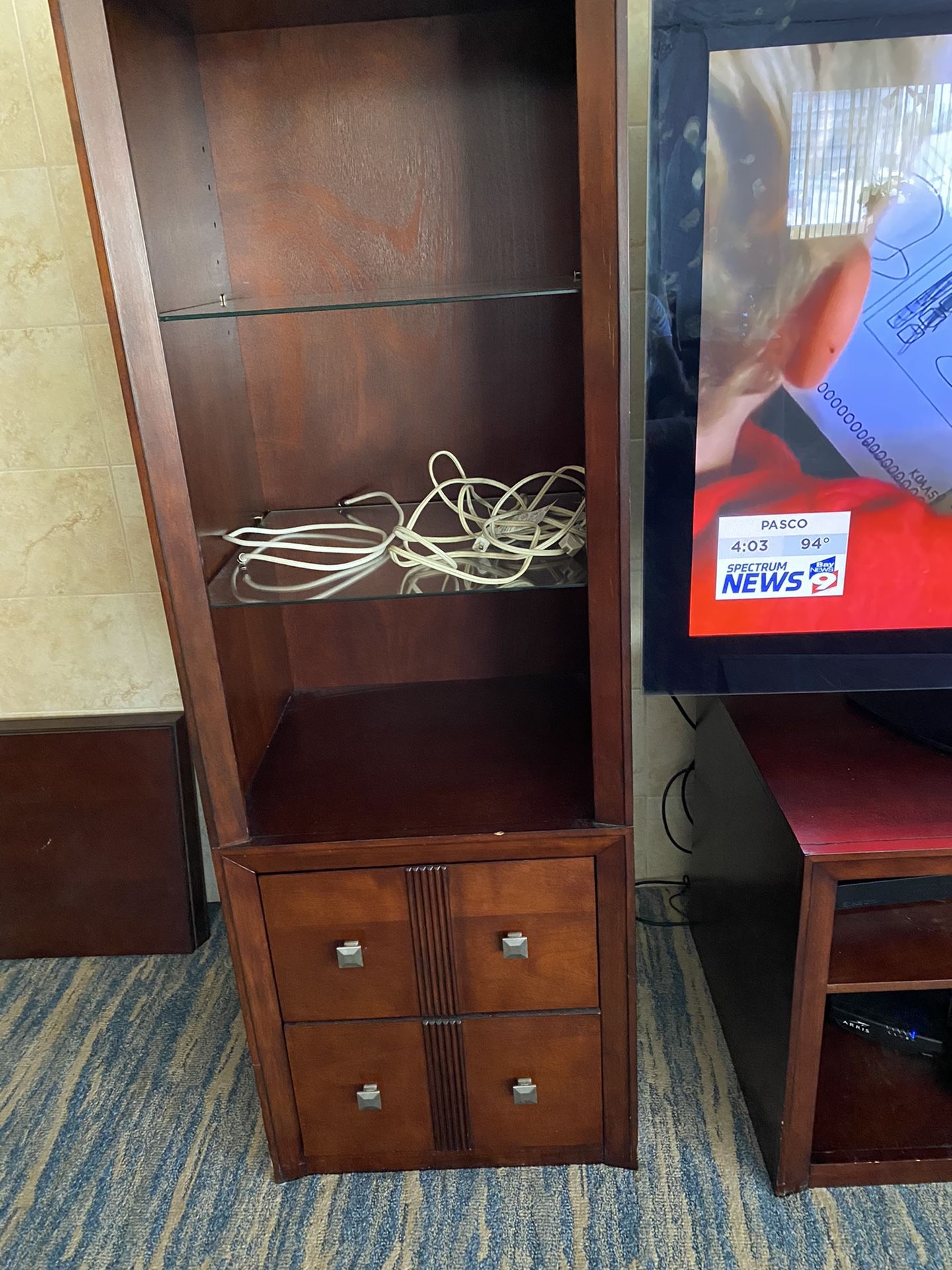 Furniture wall unit in good condition also dining room glass table with six chairs and three glass tables 500 cash