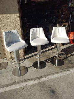 Three beautiful bar stools