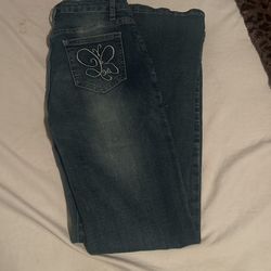 Dark Blue Jeans With Design On Back Pockets