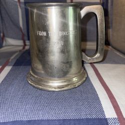 Orange, pewter mug marked England