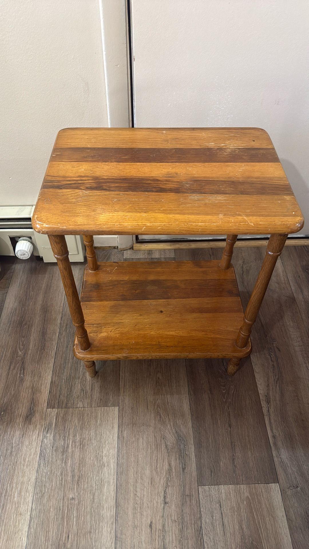 A small table with three chairs