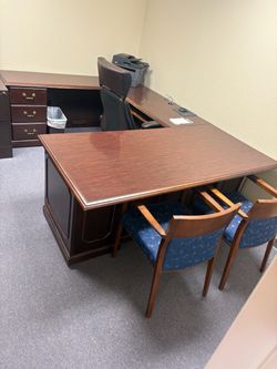 Office desk, chairs and book self