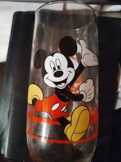 Disney Mickey and Minnie Mouse Drinking Glasses 
Set of 4 
Made In the USA 
Vintage Collectibles 
Height approx. 6" 
Width approx. 3" 
Depth approx. 3