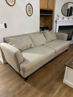 Two couches and club chair