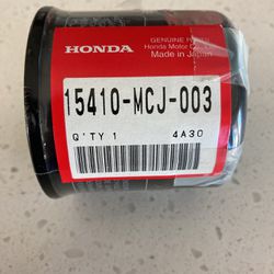 Honda motorcycle oil filter, with two washers.