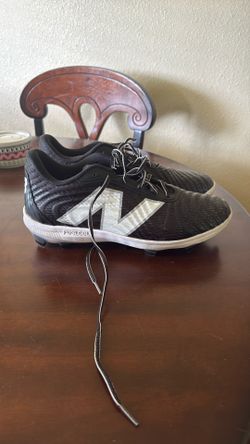 New Balance Black molded cleats