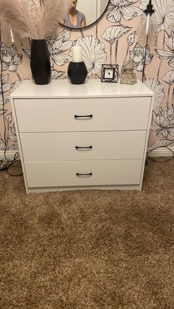 A three drawer dresser