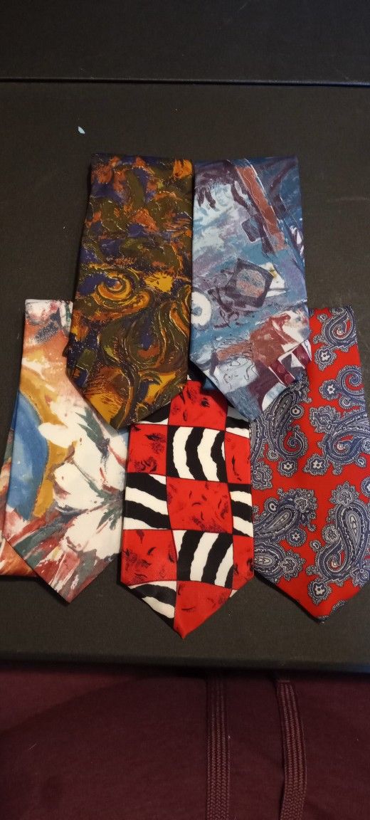 A collection of five vintage neckties with Italian silk styling, made in the USA
