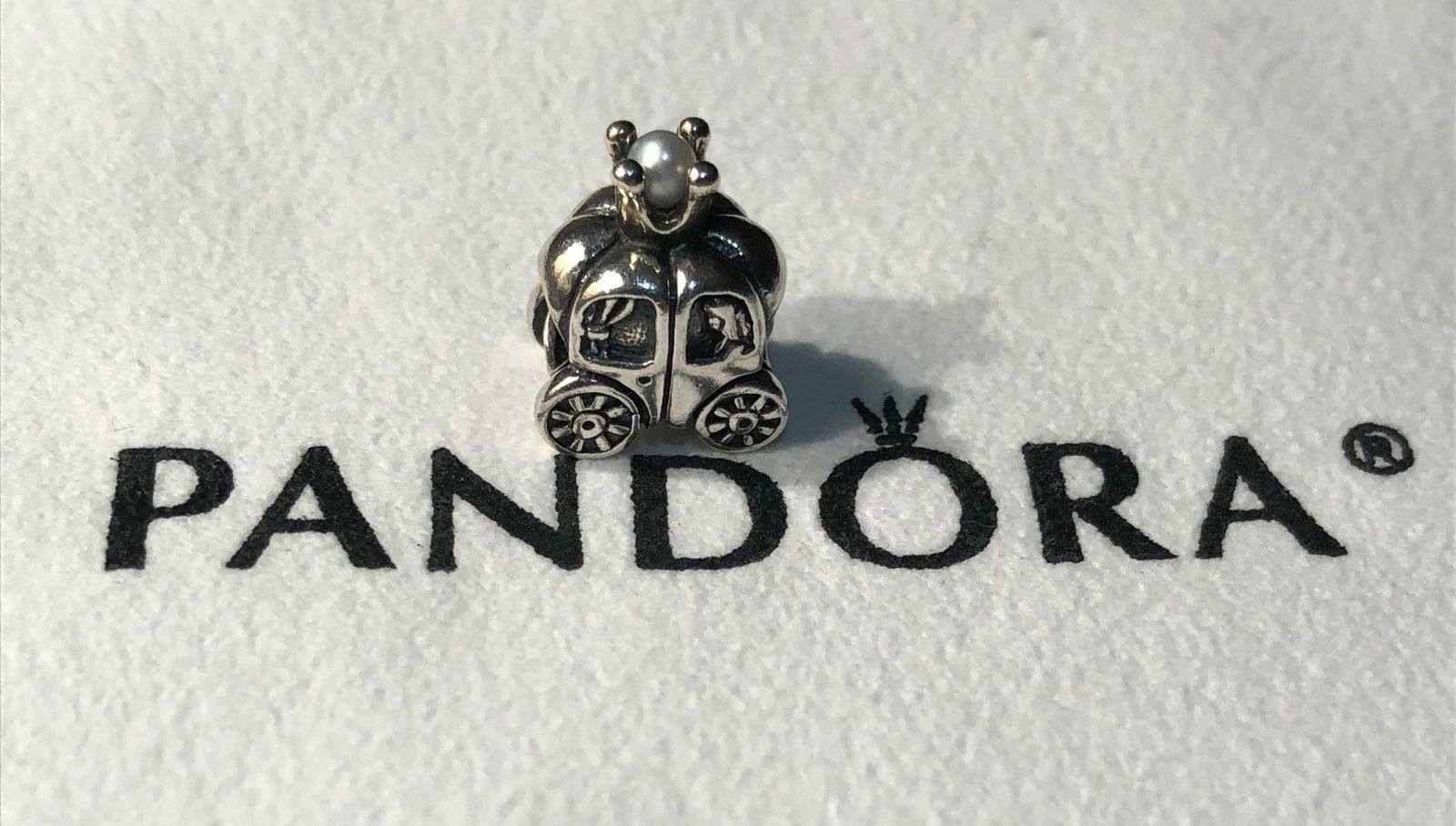 Authentic Pandora “Royal Carriage“ Charm. Sterling Silver / 14 K Gold / White Pearl. New w/o box.