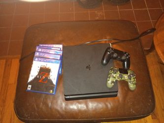 PS4 Slim Console with 2 Controllers and Games