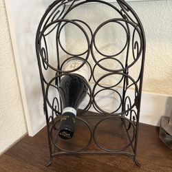 Wine rack with 6 openings for wine. 