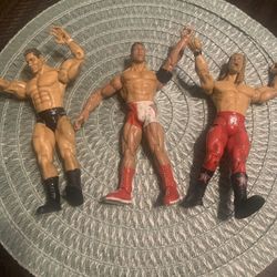 WRESTLING FIGURES 3 X   $12