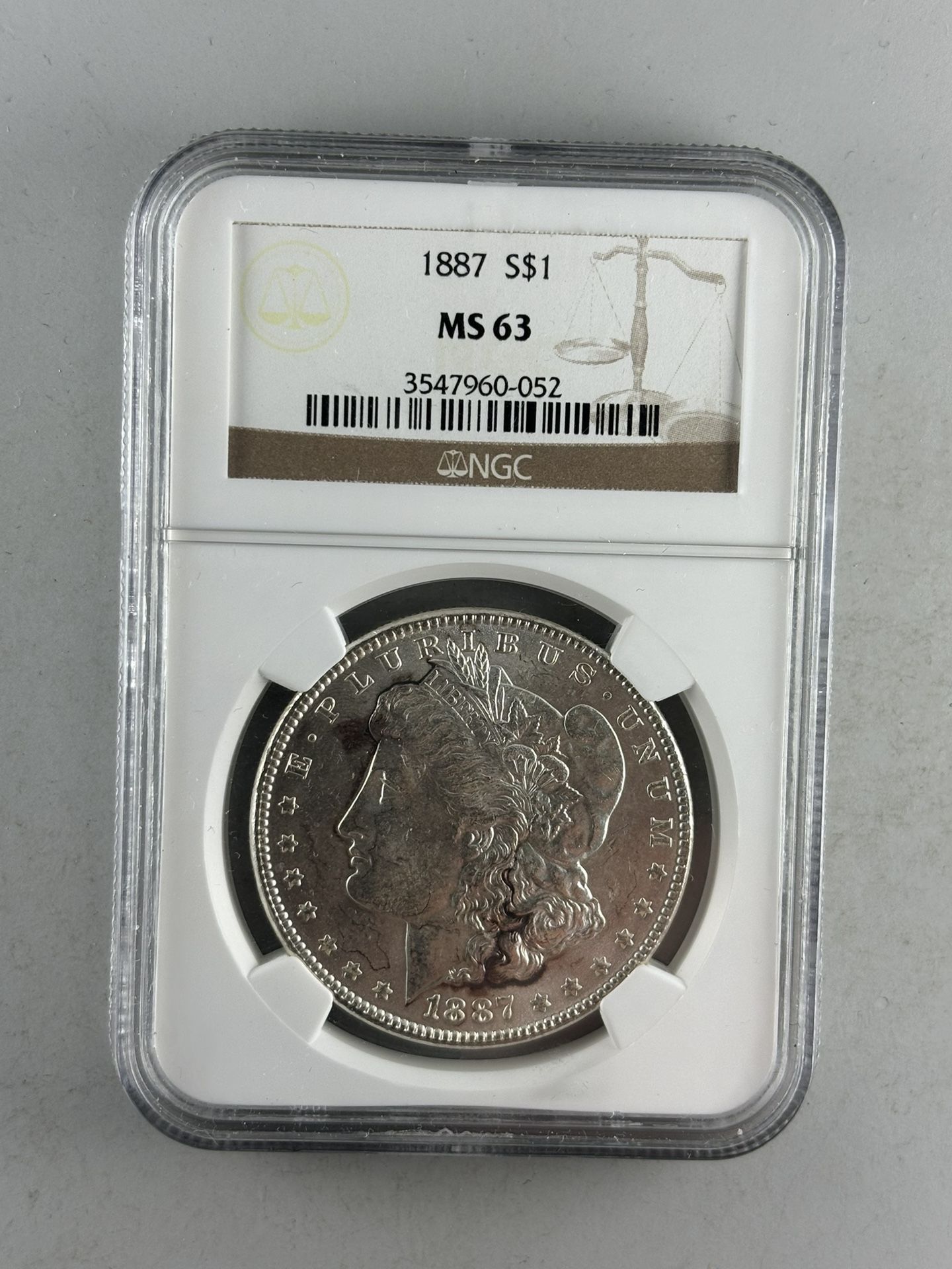 1887 Morgan Silver Dollar, NGC MS-63 -- GORGEOUS CERTIFIED COIN!
