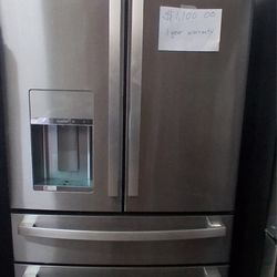 New GE refrigerator w/ 1 year warranty