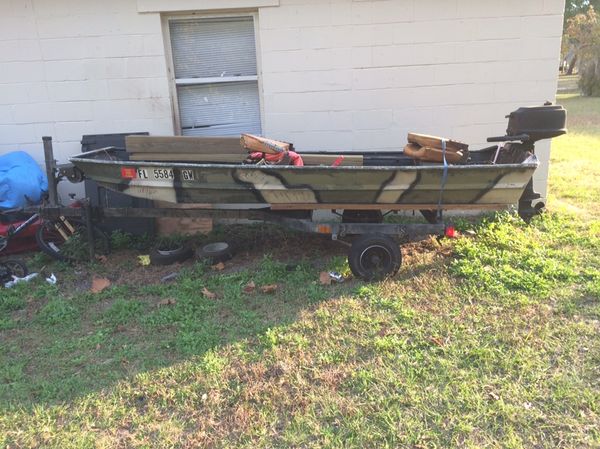 12' jon boat with trailer and a 5hp motor trade for dirt 