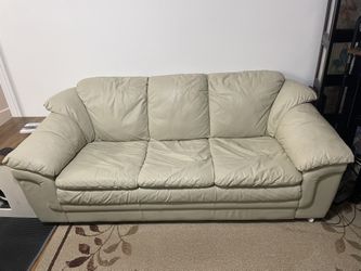 Beautiful, plush, easy white leather sofa. Originally $799, now $100