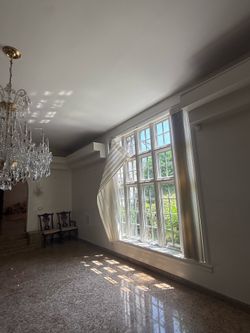 **Elegant Crystal Chandelier**  Beautiful crystal chandelier with a timeless design that adds elegance and sparkle to any dining room or formal living