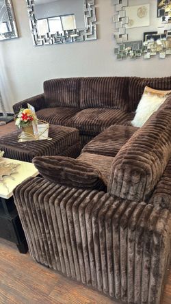 Brown sectional with ottoman
