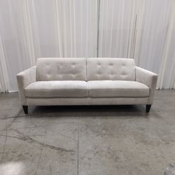 Cream Tufted Fabric Sofa with Tapered Legs