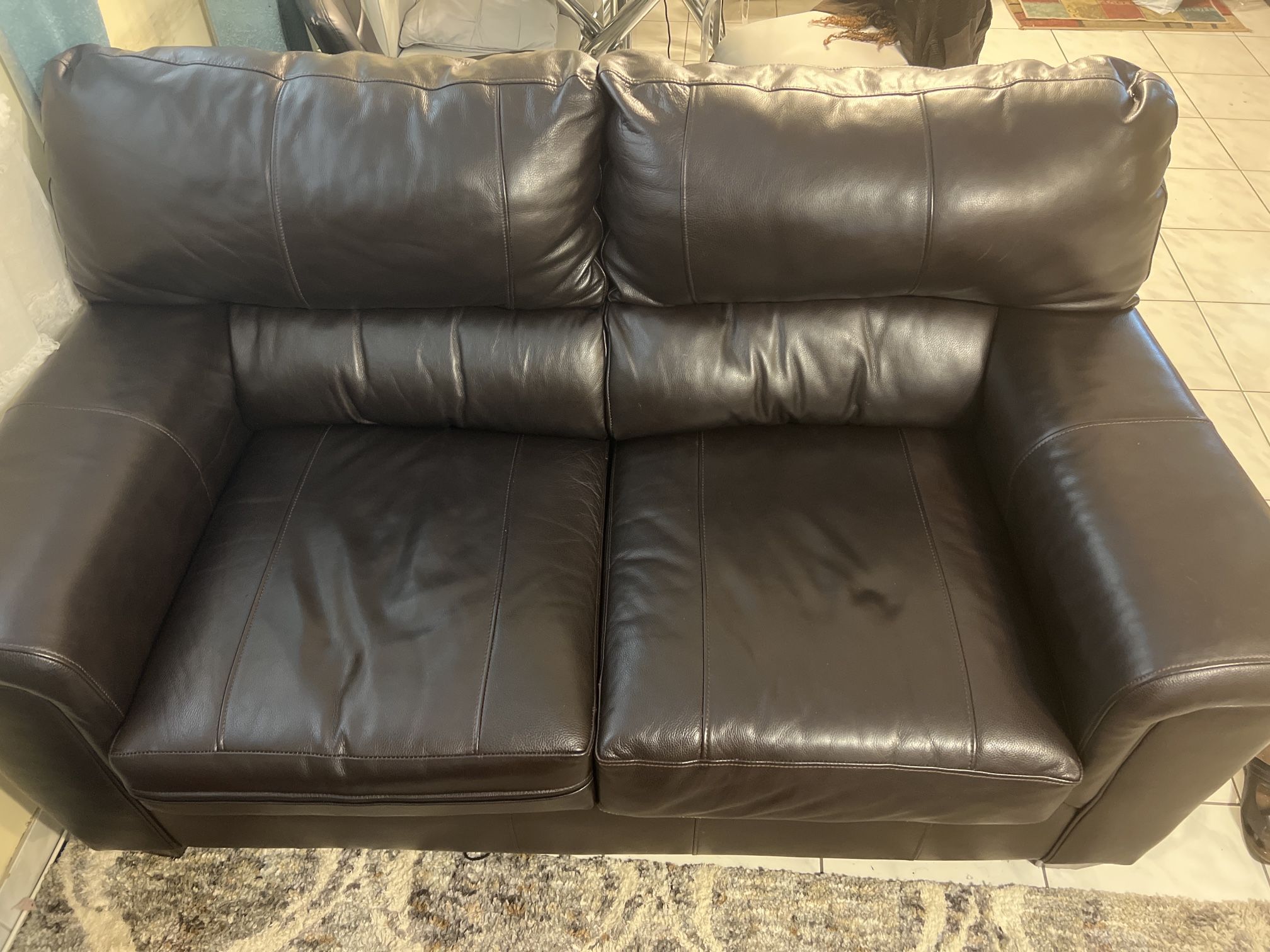 Brown Leather Loveseat