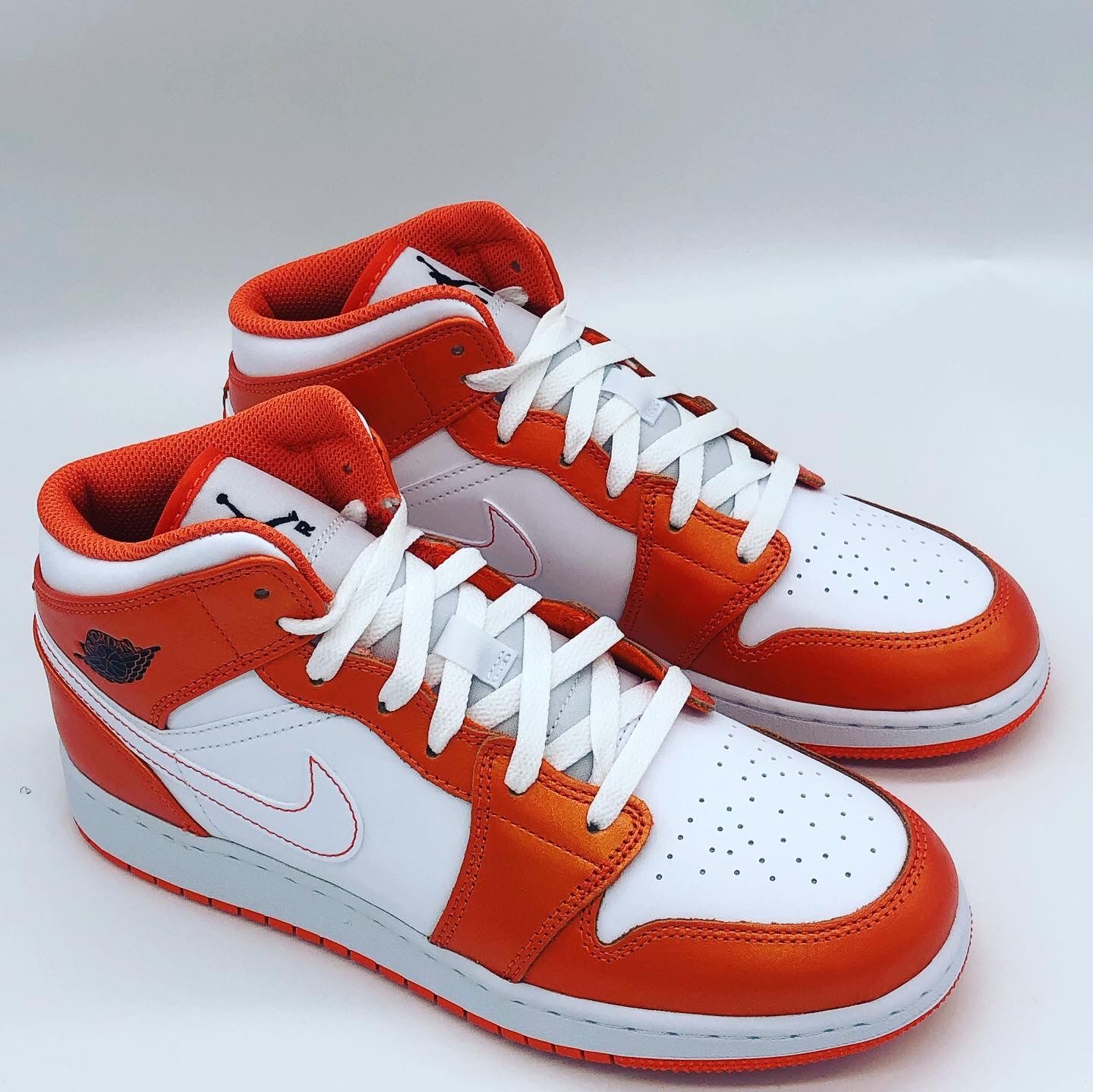 Jordan 1 Mid Electro Orange