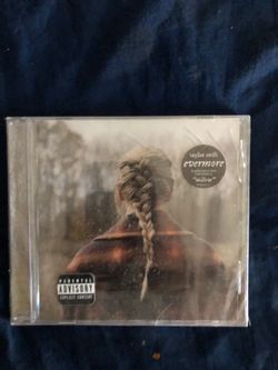 Brand new sealed never used Taylor Swift Evermore Album