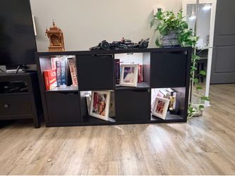 Customized bookshelf with elegant accent doors and LED lights