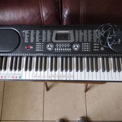 Selling A 61- Keys , Portable Keyboard With Power Cord.Excellent Condition!