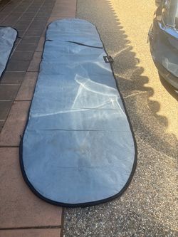 13’6” x 4’6” surfboard bag.