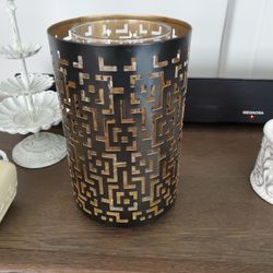Candle holder with glass insert