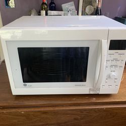 GE Microwave/ Convection - Works Great Cosmetic On Front 