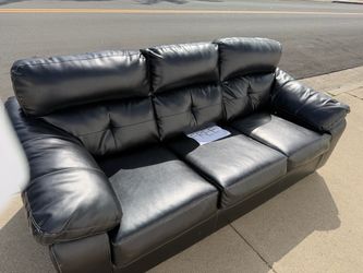 Free black leather sofa