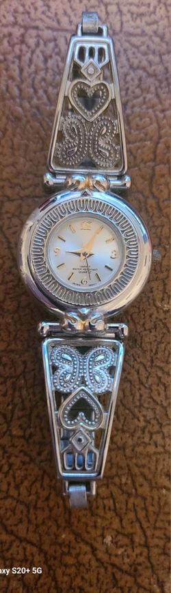 Woman's Silver Toned Stretch Band Analog Watch