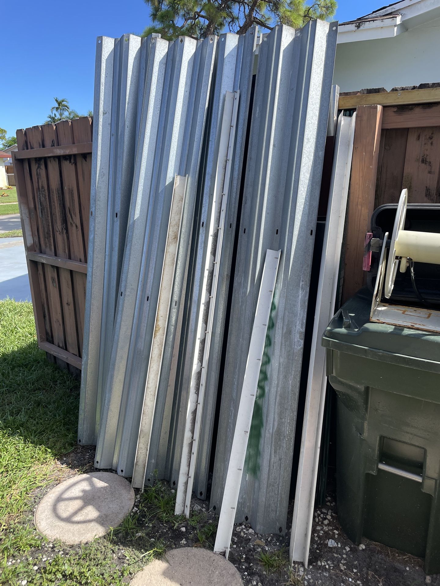 4 steel hurricane panels with some mounting brackets everything for $50
