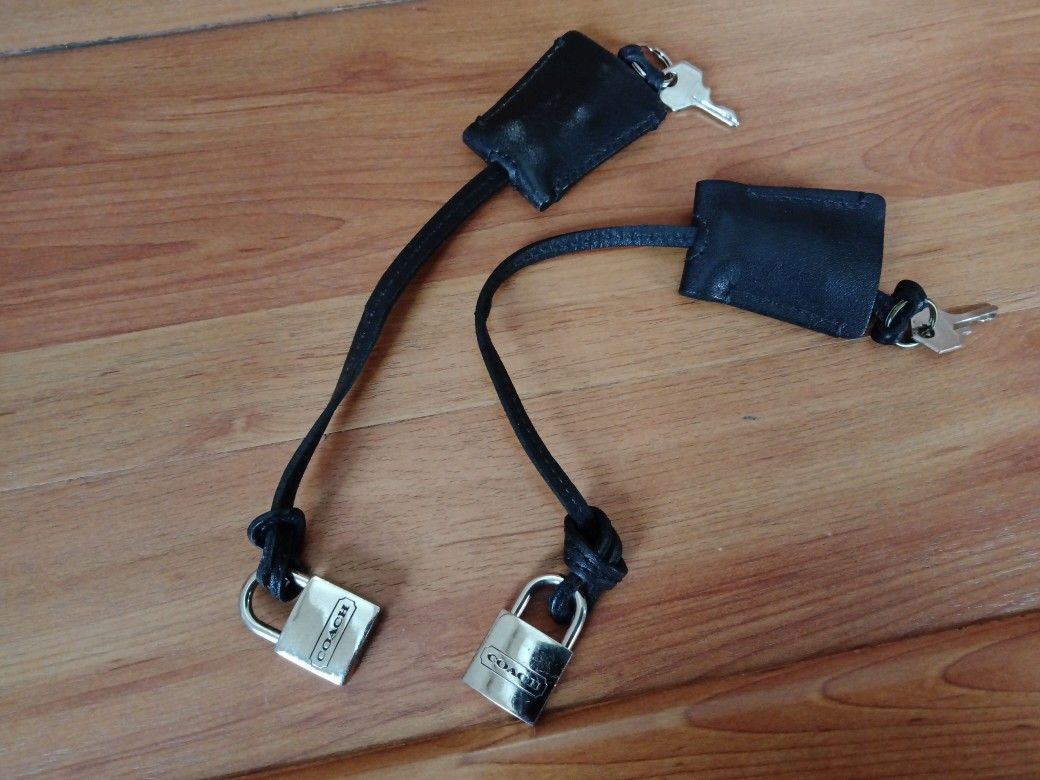 2 Pieces Of Coach Leather NYC Palladium Silver padlock W/ Key & Black Leather Clochette