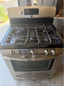 Kenmore stove and microwave.