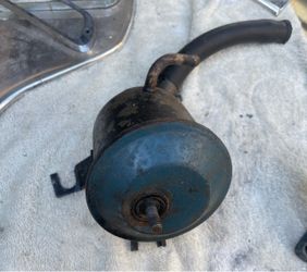 Ford power steering reservoir.