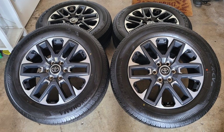 20 inch rims Stock rims and tires TOYOTA TUNDRA all matching  YOKOHAMA  GEOLANDAR X-CV 265/60/20 BRAND NEW RIMS AND TIRES from a 23 Tundra rines