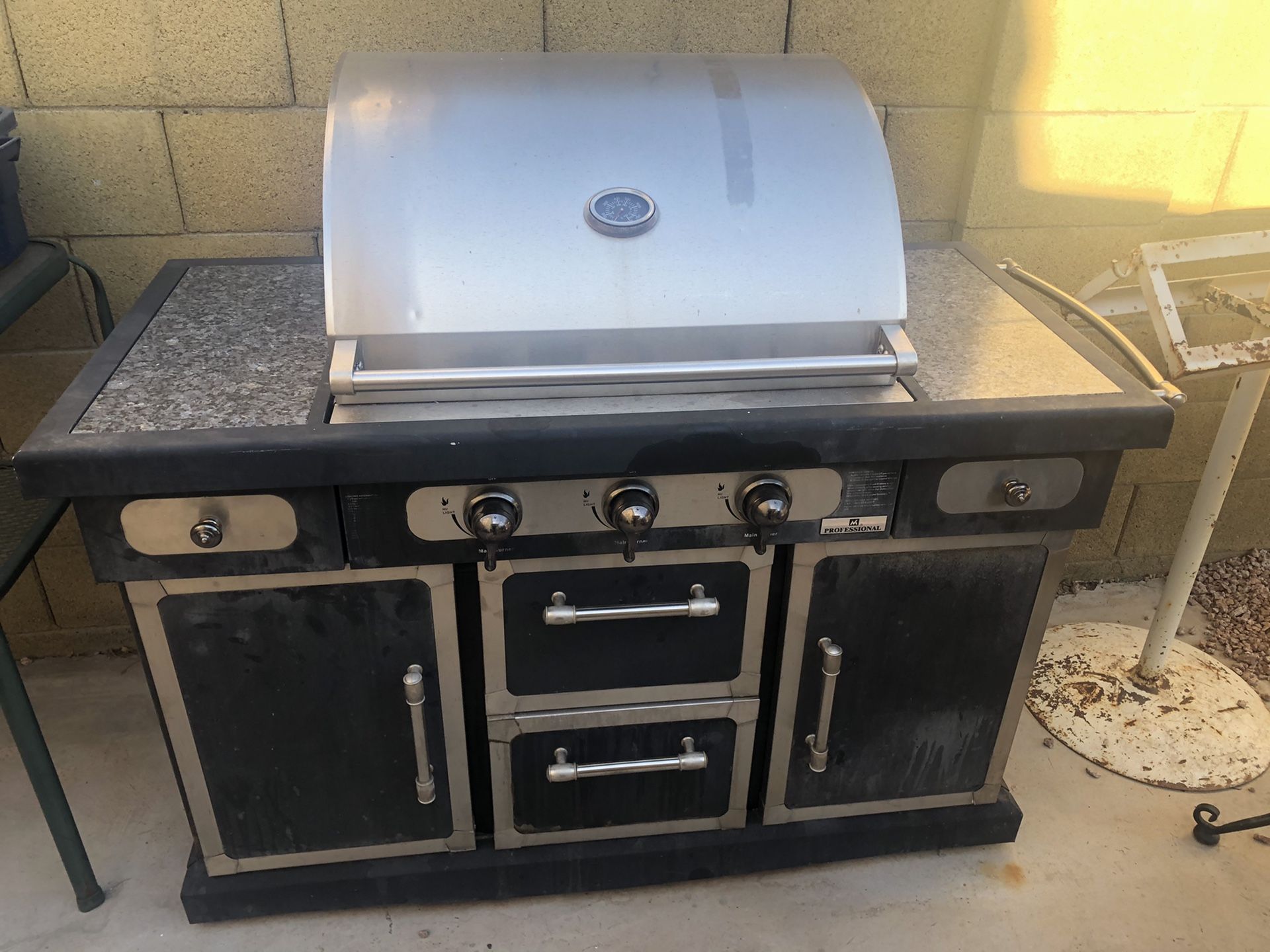 Members mark barbecue grill